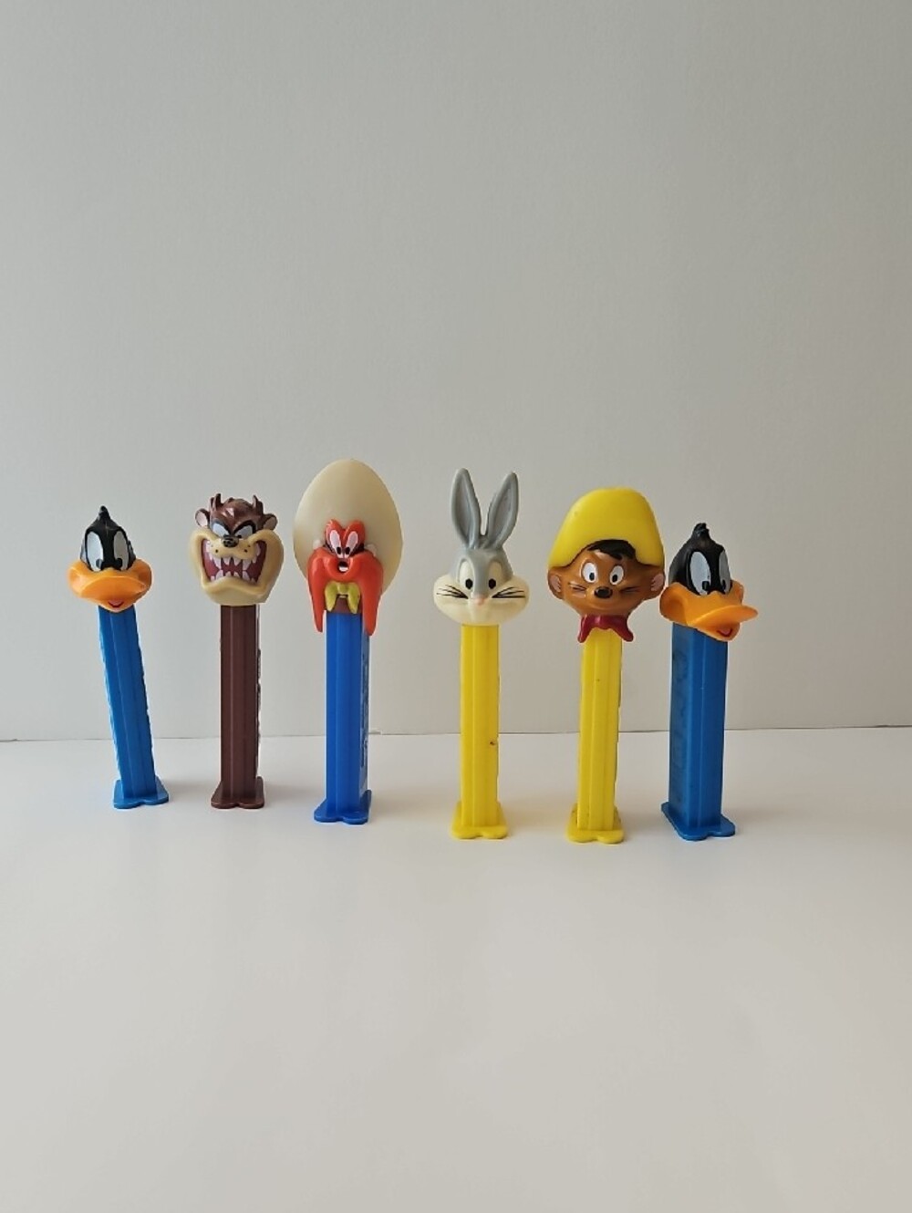 Vintage-Classic Cartoon Character PEZ Candy Dispensers - Blue, Yellow, Brown